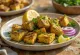 Hariyali Paneer Tikka paneer prăjit cu ierburi verzi servit cu coriandru și lămâie